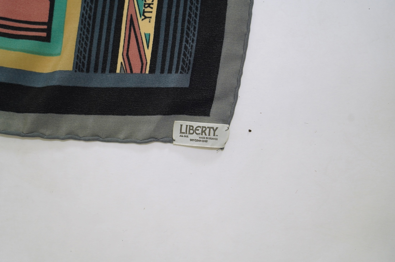 Four Liberty scarves and a Jaegar scarf